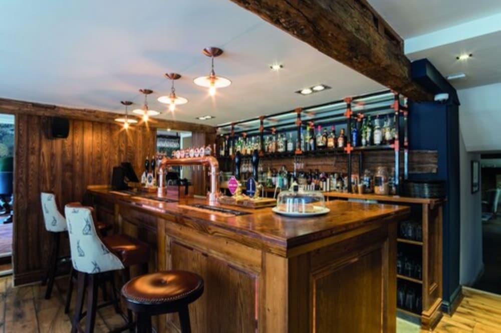 The Fleece At Cirencester Luaran gambar The bar at The Old Dispensary